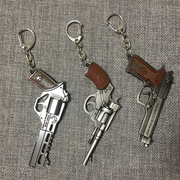 

Handgun keychain men 039 game gun model collection pi tol key chain ring revolver ouvenir men boy gift women bag charm