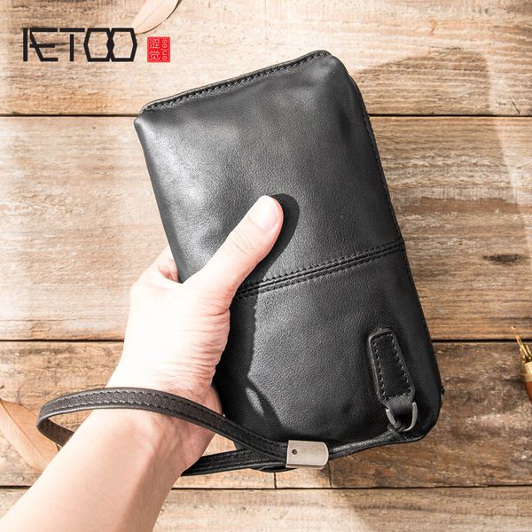 

aetoo leather handbag, men's soft leather retro casual long wallet, men's head zipper wallet, trend mobile phone bag