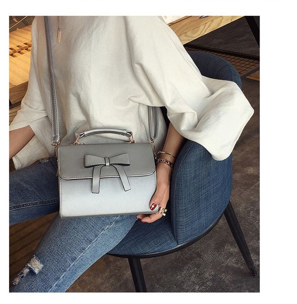 

2019 new korean version of the trend of fashion wild shoulder bag solid color bow decoration ladies handbag messenger bag