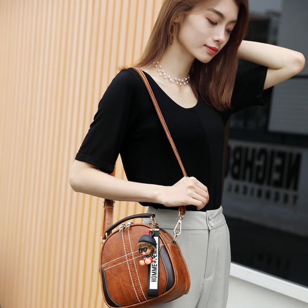 

bxx sac / 2019 fashion luxury women's handbags designer joker shell bag hit color shoulder messenger packet ze352