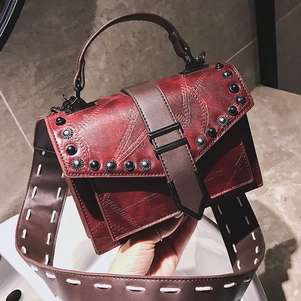 black rivet handbags