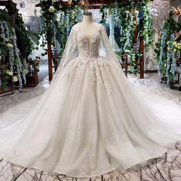 

2019 latest bohemian wedding dresses sleeveless open keyhole back illusion deep v neck shining sequins applique pattern bridal gowns, White