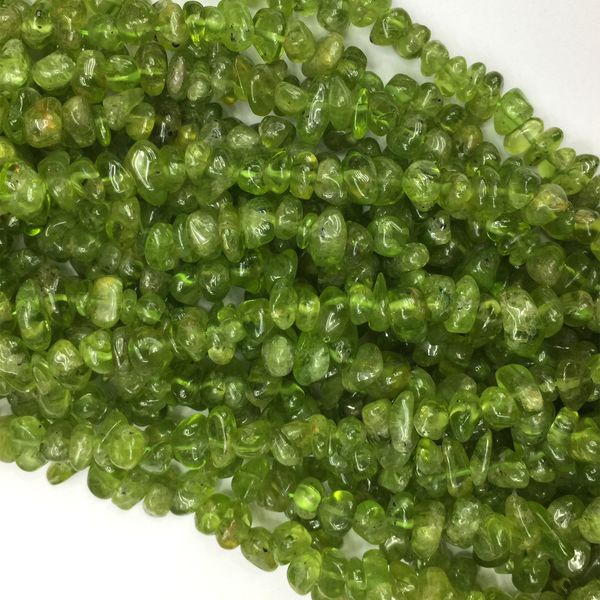 

wholesale natural genuine green peridot chip nugget form 5x8mm 15" 05779, Black