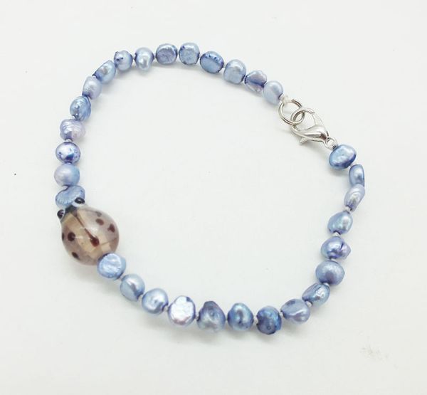 

4mm natural baroque pearl and ladybug bracelet. classic gift 7.5, Black