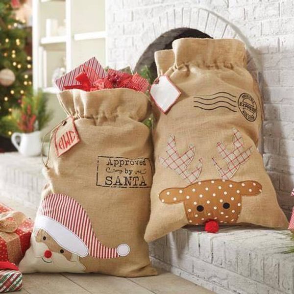 

20pcs/lot christmas new santa sack fake burlap soft santa gift bags christmas tree decoration canvas sack good quality