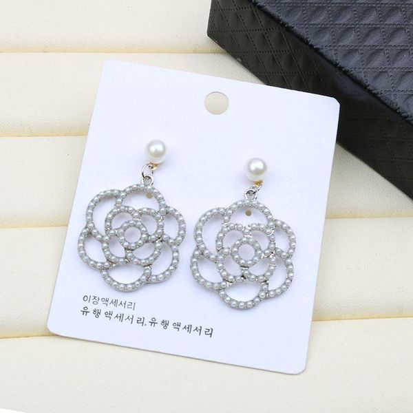 

korean style s925 silver needle korean temperament retro metal camellia earrings net red with the same model face thin pearl ears