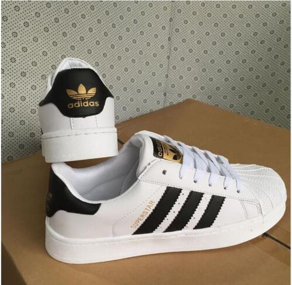 

65dida tan mith hoe brand women men fa hion neaker ca ual leather uper tar kateboard punching white girl hoe