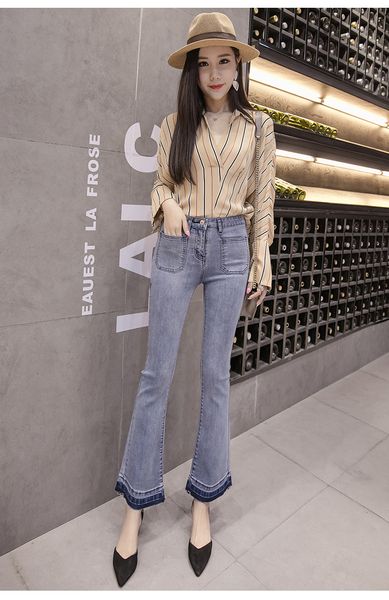 

blue gray jeans trousers of female speakers