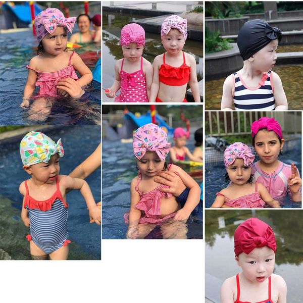 Cuffia da nuoto per bambina di nuovo design Cuffia da bagno elastica con fiocco stampato floreale in cotone Cuffia da nuoto per bambini