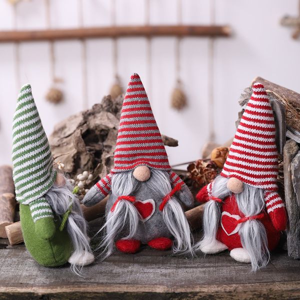 

christmas decoration striped hat tied beard hanging legs no face dol#aq