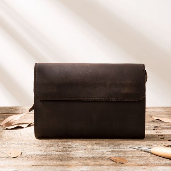 

оригинальный рука держит мешок мужской ретро кошелек досуг маленькая рука хватает мешок