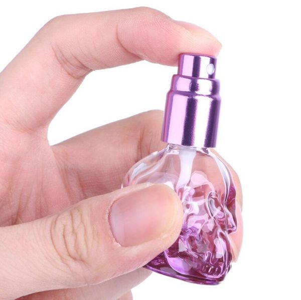 8ml Mini Vuoto portatile da viaggio Bottiglie riutilizzabili Forma di teschio Bottiglie di profumo di vetro colorato Bottiglie di profumo campione 7 colori Spedizione gratuita