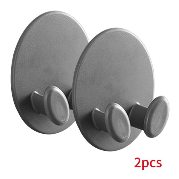 

2pcs plug hook socket holder adhesive two feet kitchen office cable organizer easy install wall mounted space saving storage