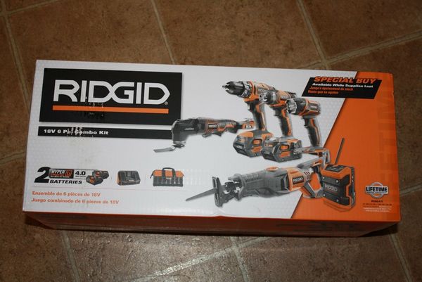 

New ridgid 18 volt 6 piece cordle tool et with charger and batterie