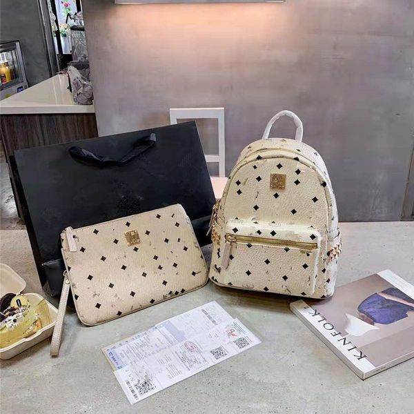 

new side rivets backpack fashion large capacity travel bag handbag. both men and women school bags for teenage girls luxury women handbags