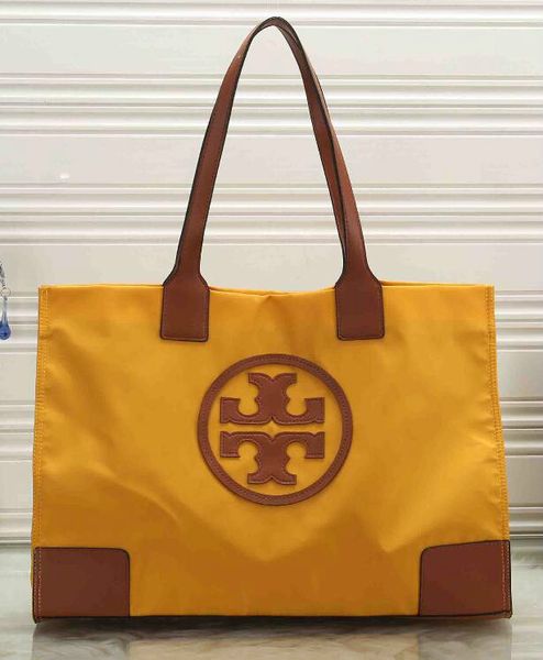 

New fa hion men women travel bag duffle bag brand de igner luggage handbag large capacity port bag