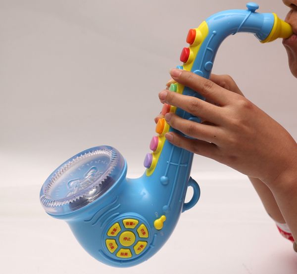 Бесплатная доставка ребенок саксофон духовой инструмент игрушка саксофон большой рог музыкальный инструмент игрушка внешний MP3 свет ремешок