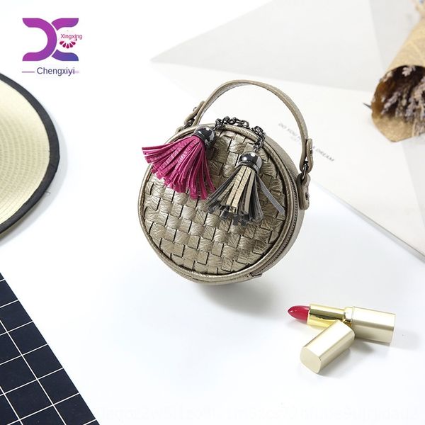 

2020 hand-woven hand hand tassel small round bag handbag wallet messenger shoulder chain mini coin purse