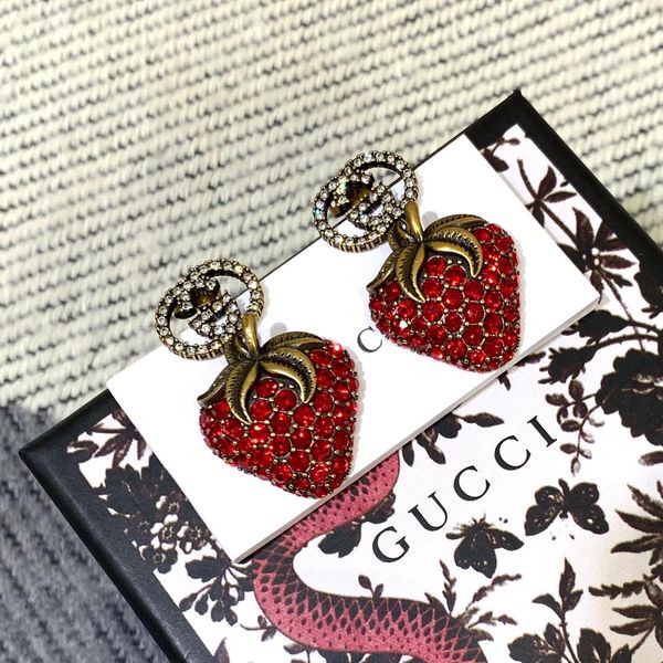 

Guc 2019 cla ic peach tree earring per onality funny vi ion hipping