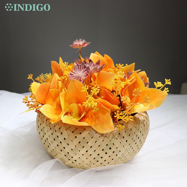 

indigo- orange cymbidium flower arrangement with basket gift table bonsai event centerpiece ing
