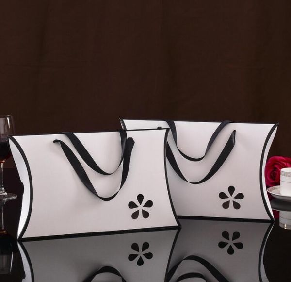 

10pcs lot white black pillow hollow gift box with handle, scarf towel silk t-shirt paper packaing box,shopping bags design
