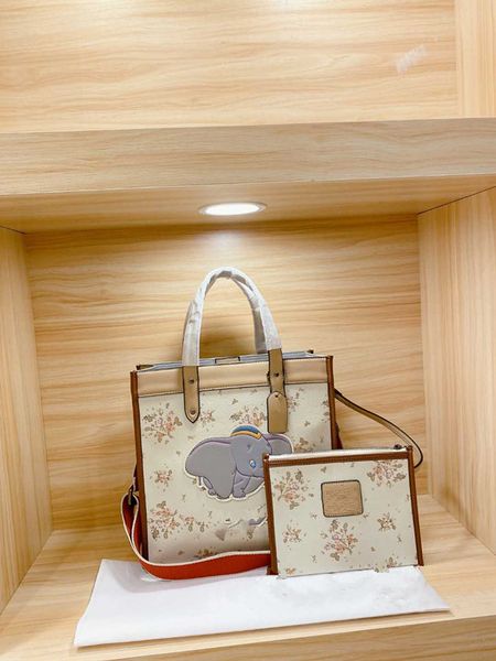 

in 2020, the new one shoulder dumbo letter package portable canvas bags fashionable shopping bags