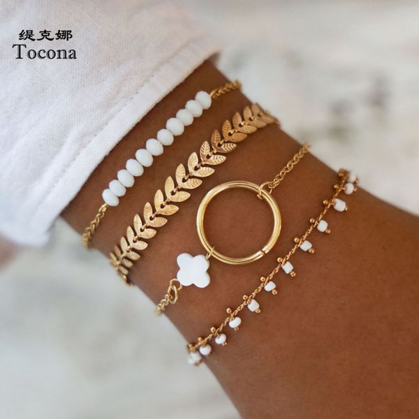 

tocona 4pcs/sets bohemian gold alloy flowers bracelets for women 2020 white bead leaf hollow geometric jewelry gift 14411, Black