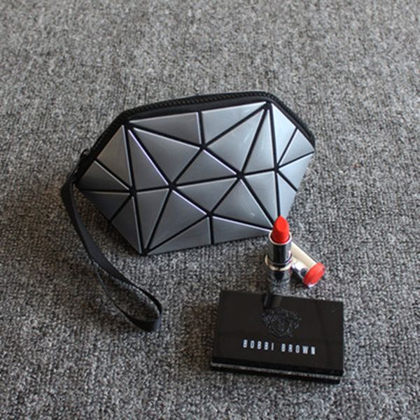 

2018 new geometric zipper cosmetic bag women luminous makeup bag ladies cosmetics organizer folding travel make up wholesale