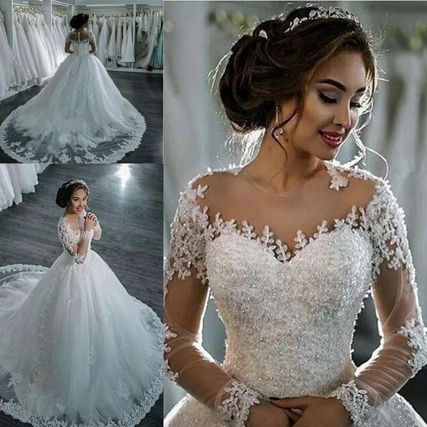 

New Dubai Elegant Long Sleeve A-line Wedding Dresses Sheer Crew Neck Lace Appliques Beaded Bridal Gowns with Buttons Vestios De Novia