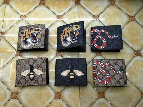 

Новый стиль Женщины Мужчины бумажники Luxury Leather Fashion Short бумажники способа высокого качества леди кошелек с коробкой