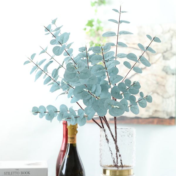 

artificial blue eucalyptus leaves branch fake grass table plant home shop wedding floral arrangement