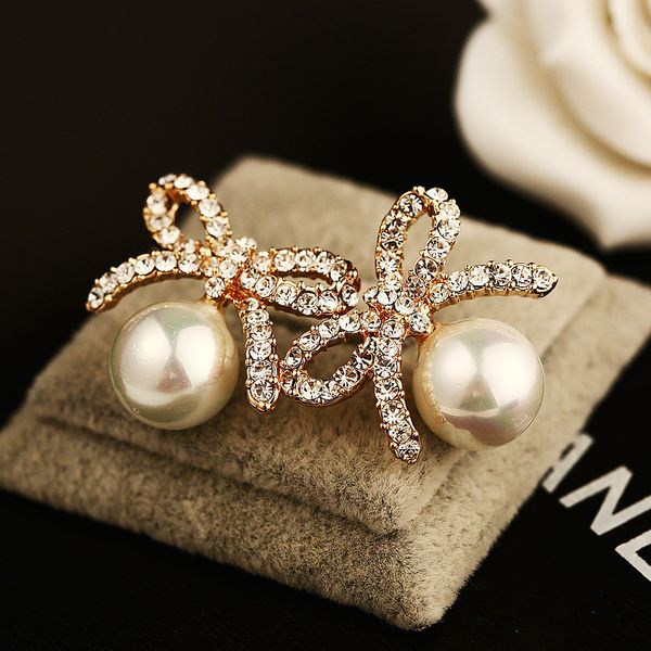 

New trendy fa hion luxury de igner cute diamond rhine tone bow pearl tud earring for woman ilver pin, Golden;silver