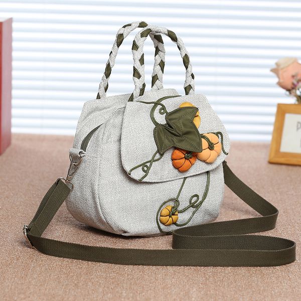 

a new style women's handbag, one shoulder bag, canvas messenger bag, mini art handbag, multi-purpose women's bag