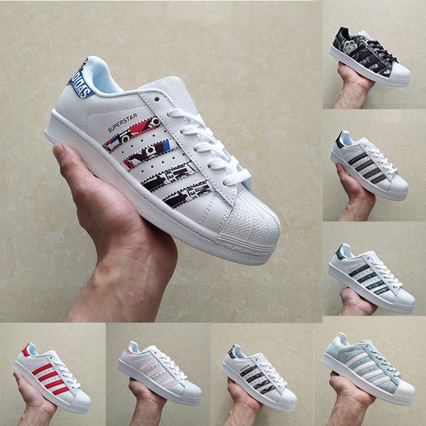 adidas superstar blancas y azules