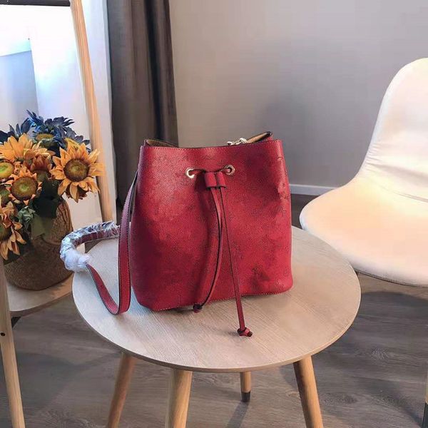 

the new female fashion in europe and the bucket with the bag package joker contracted one shoulder aslant handbag designer messenger bags