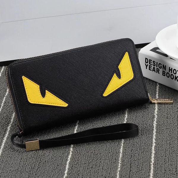 

Нестандартный цветной кошелек-гармошка Little monster из натуральной кожи ската / Самый