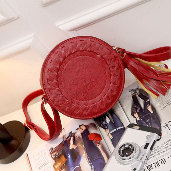 

2018 new female handbag korean edition fashion tassel small round bag woven mini bag circular shoulder
