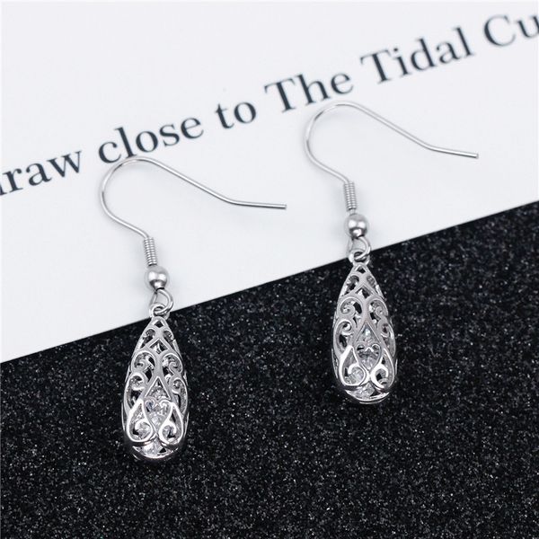 

cross border creative copper plated platinum water drop earrings high end atmospheric earrings in europe and america, Golden;silver
