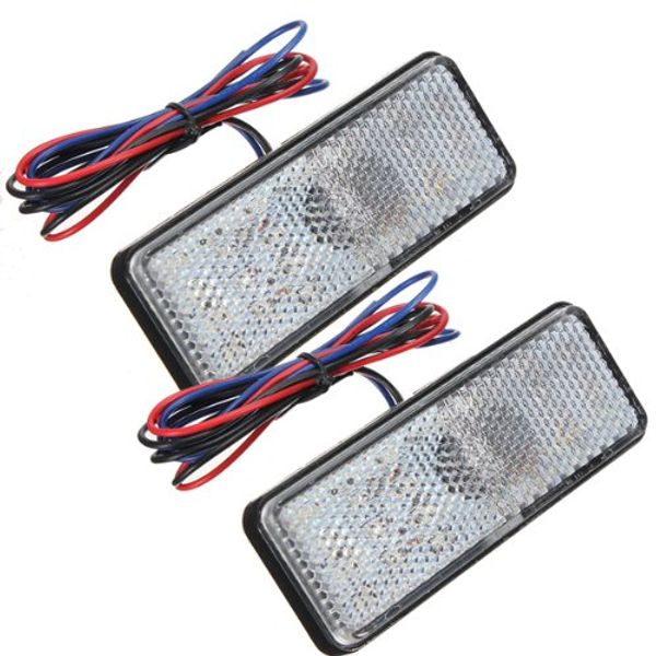 

a pair of led lights taillights motorcycle trailer truck truck white