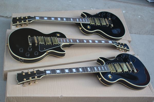 

factory custom black electric guitar with black pickguard,white pearl fret inlay,hhh pickups,gold hardware,offer customized