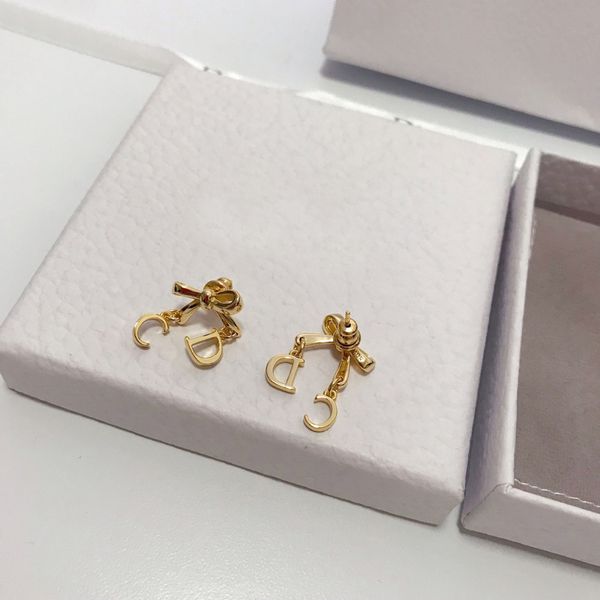 

d family/di family 2020 bow earrings female temperament female cd letter earrings xing qin, White