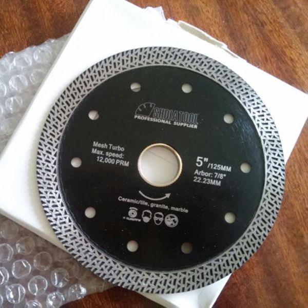 

4"/4.5"/5" jagged dia pressed sintered mesh turbo diamond saw blade cutting disc diamond circular saw blade bore 22.23mm /20m