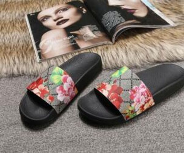 2019 hot Homens Mulheres Sandals Designer Shoes Luxo Deslize tamanho da caixa 35-46 flor Flop Summer Fashion amplo e plano Slippery Sandals Slipper Virar