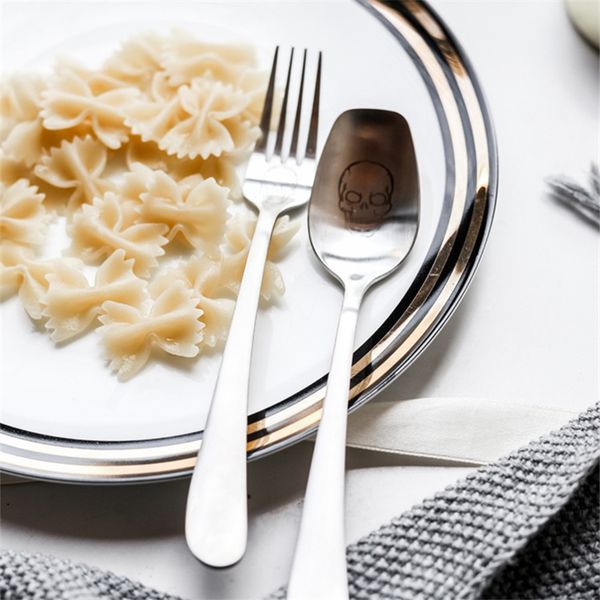 Utensílios de mesa ocidentais de desenho de aço inoxidável da colher dos crânios