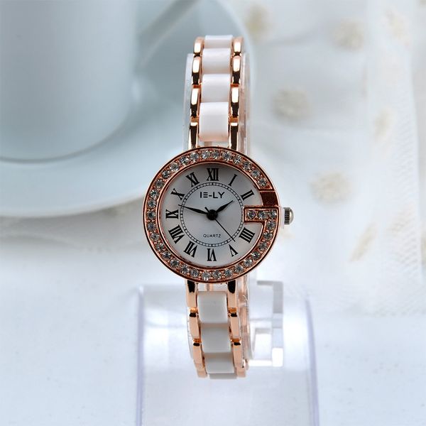 

women rhinestones alloy chain strap quartz wrist watch, Slivery;brown