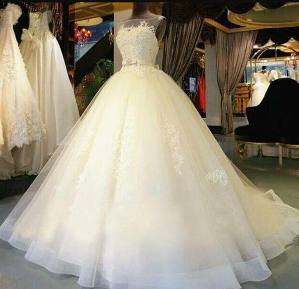 

2019 beautiful a-line sleeveless wedding dresses lace illusion bateau neckline appliques elegnat bridal gowns custom made court train, White