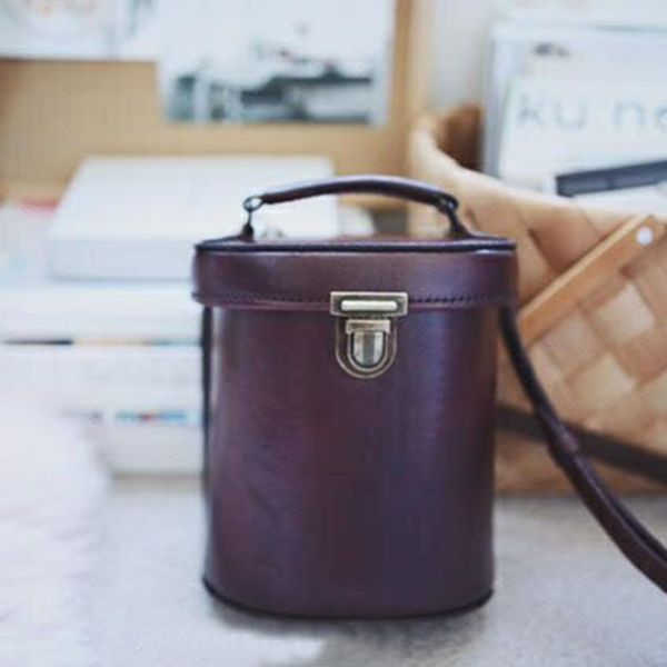 

vintage hand-made leather cross-body bag with one shoulder bucket