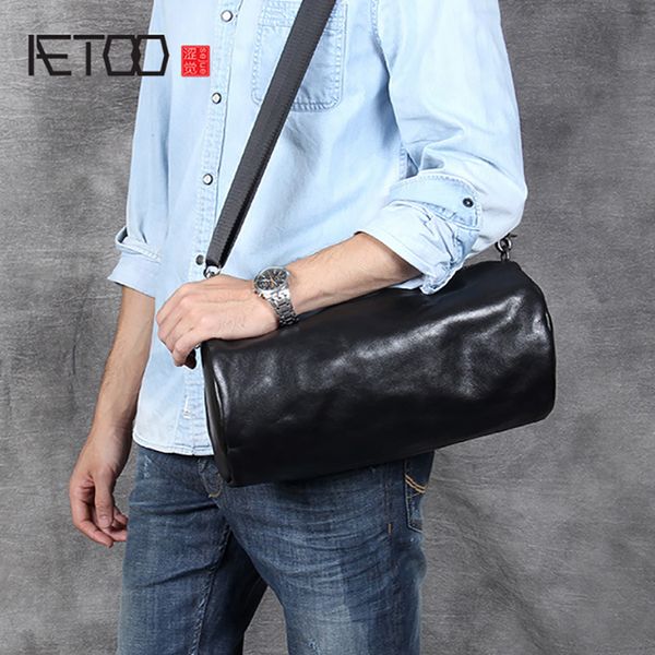 

aetoo casual head cowhide barrel bag male leather retro simple fashion shoulder crossbody bag