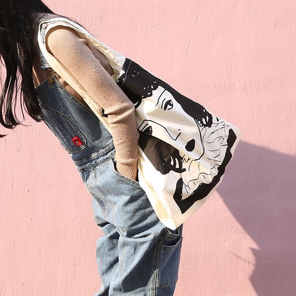 

canvas thickening literary simple large-capacity girl head print bag south korea large capacity three-grid shoulder bag