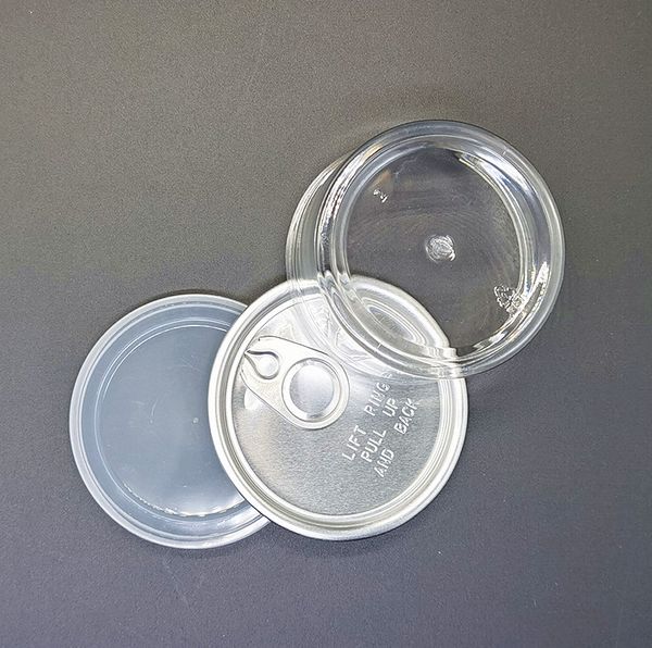 

Концентрат Контейнер Clear Plastic Tin Can 100ML Емкость 33 * 65мм 3.5Gram Запах Proof Герметичный пластиковый Jar Пищевое Херб хранения с металлической крышкой